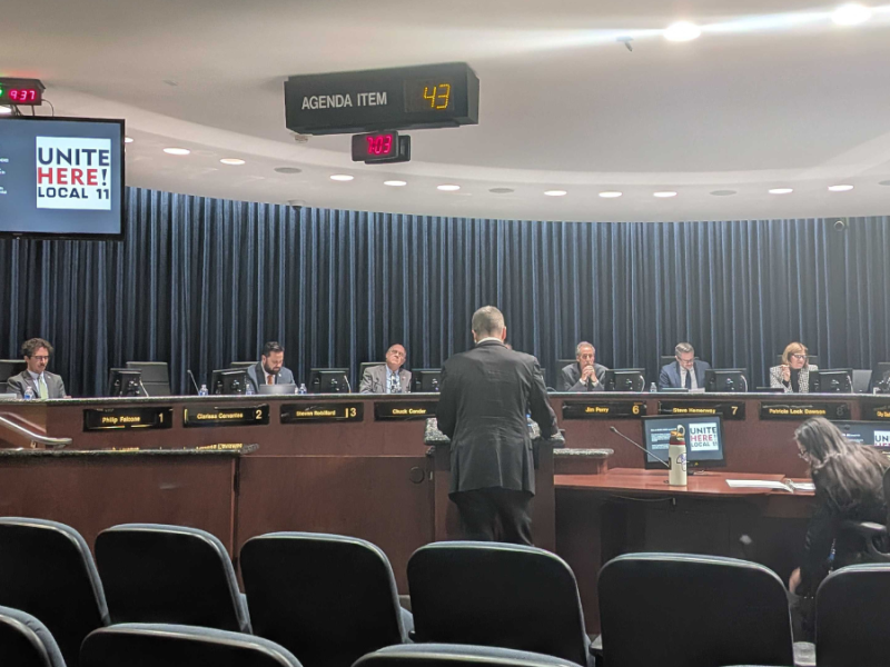 A man addresses the Riverside City Council.