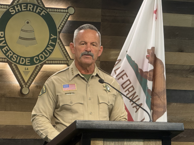 Riverside County Sheriff Chad Bianco at a lecturn
