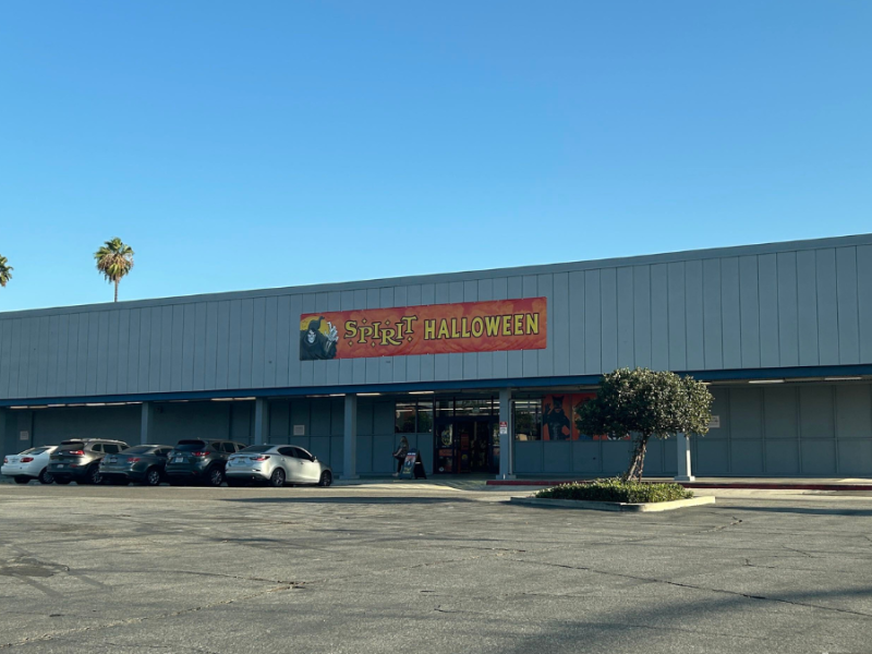 A large storefront with a Spirit Halloween sign out front.